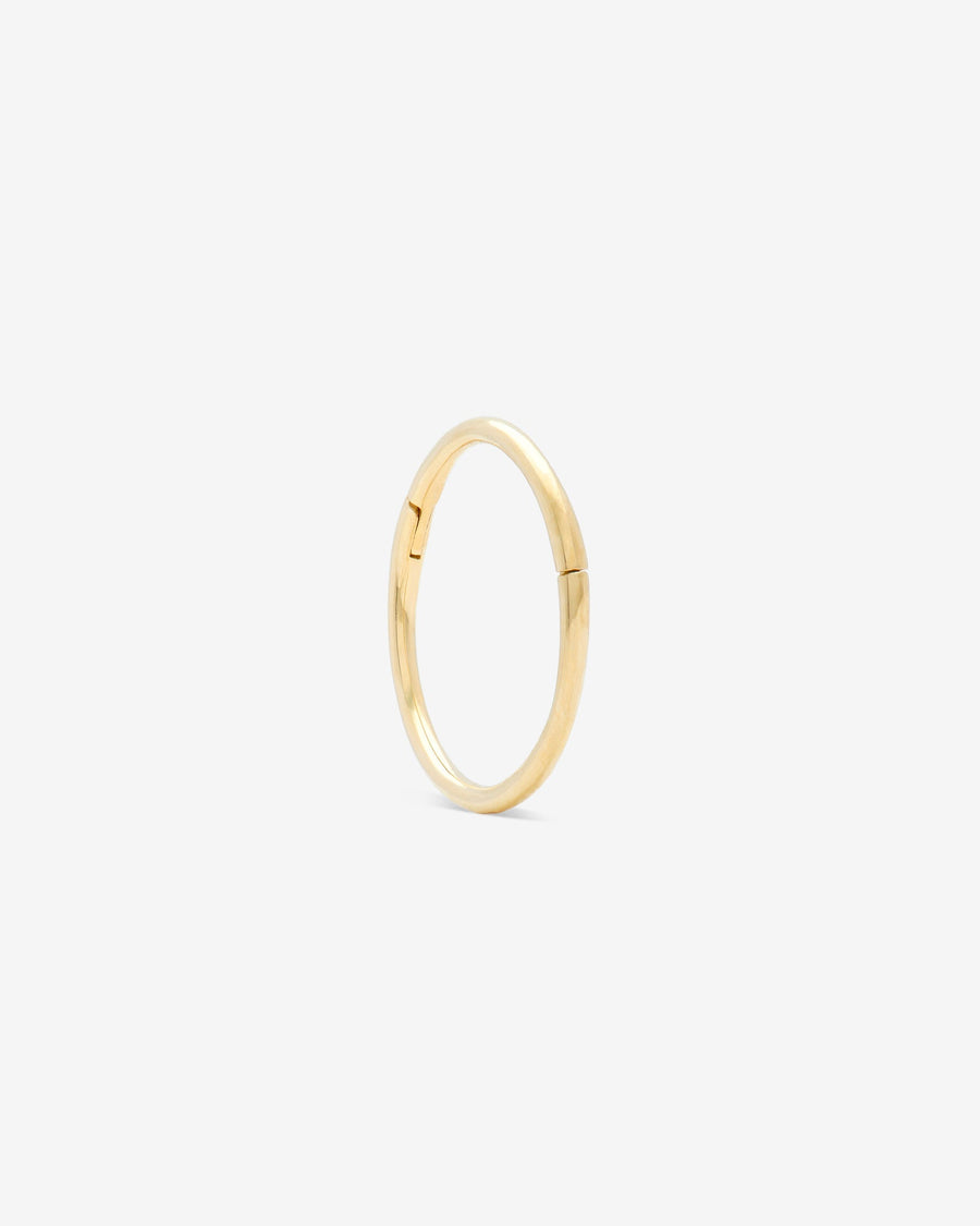 Seamless clicker in 14k yellow gold.
