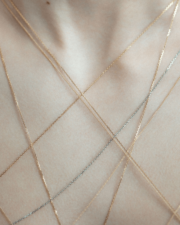 Forever necklace in 18k white gold, shown worn.