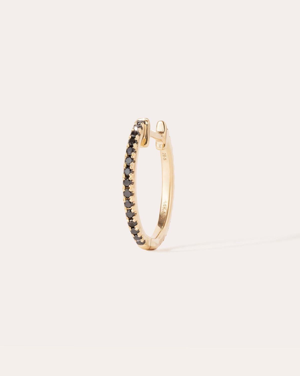 Eclipse hoop in 14k yellow gold, detail view.