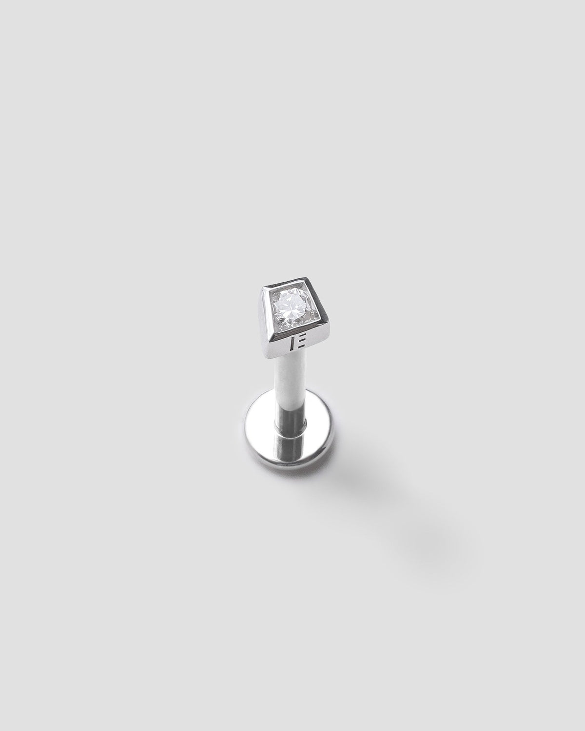 Frame labret in 14k white gold, set with a lab grown diamond, detail view.