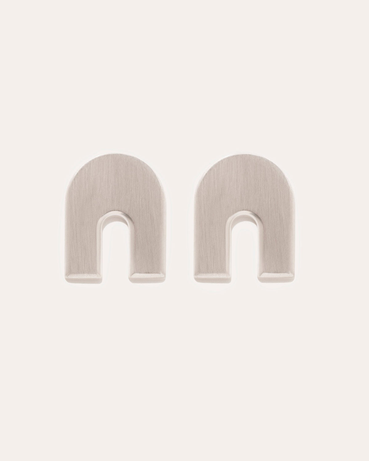 Iris Arch studs in 925 silver.