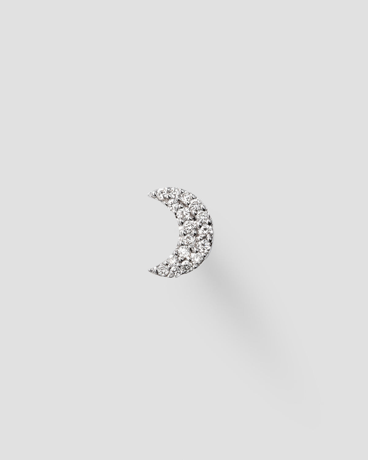 Luna in 14k white gold, set with a white diamond.