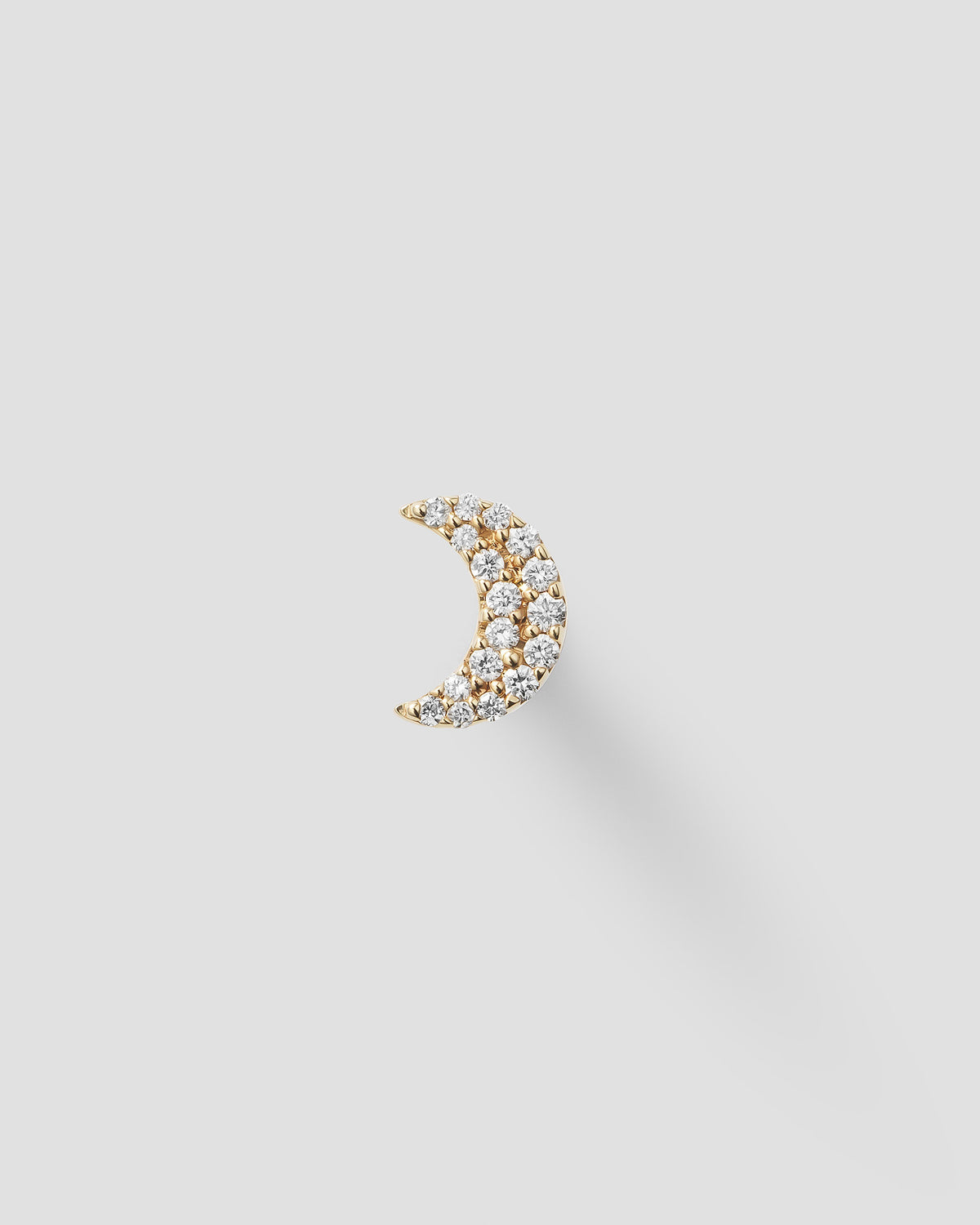 Luna in 14k yellow gold, set with a white diamond.