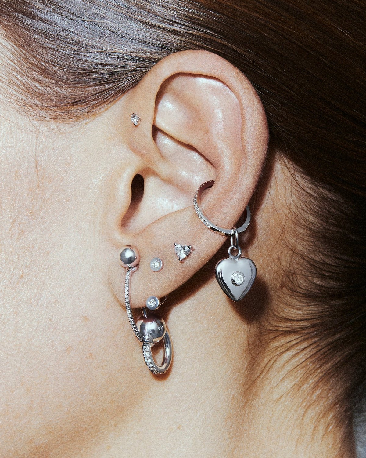 Ivory labret, shown worn.