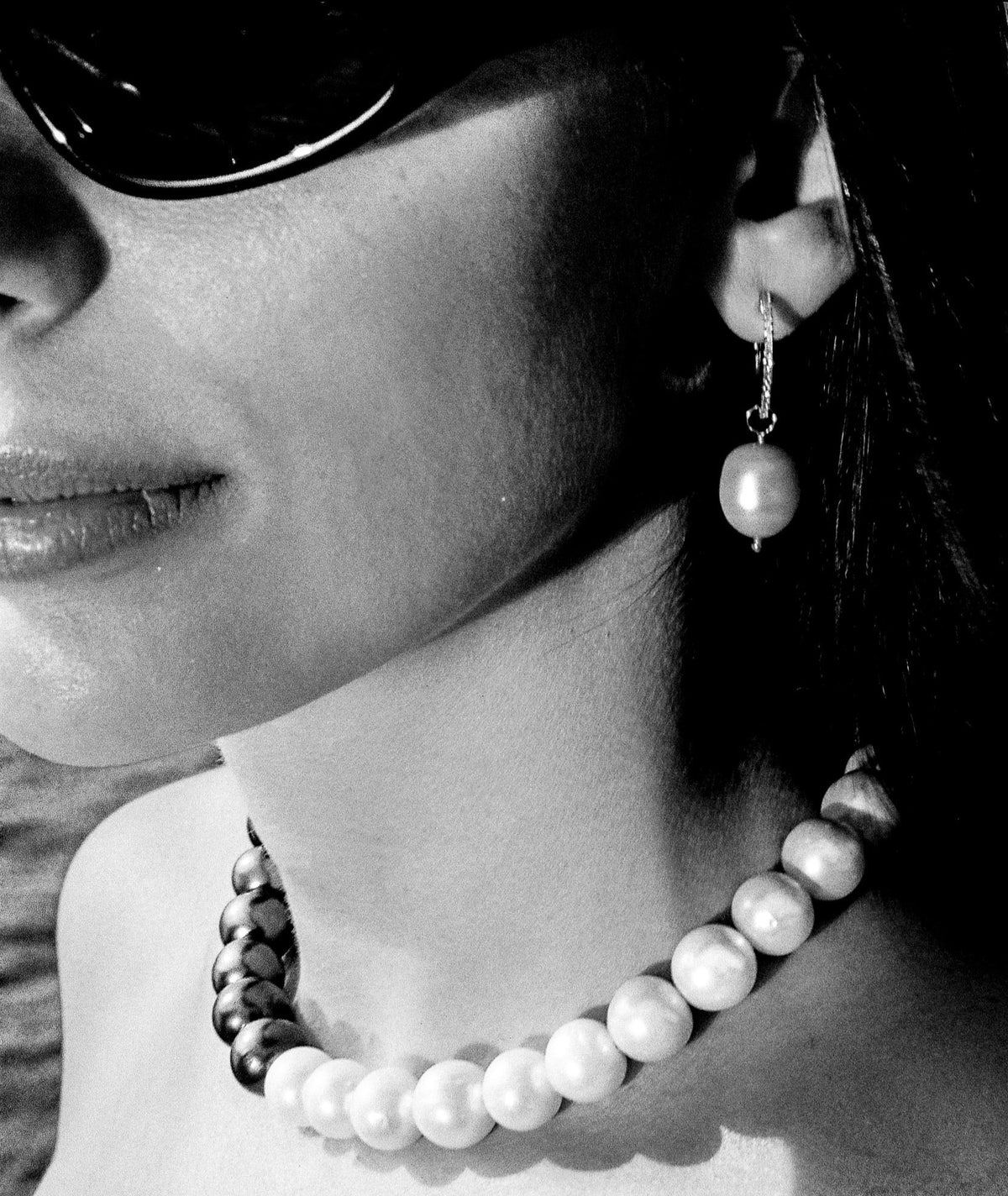 Ares pearl necklace, shown worn.