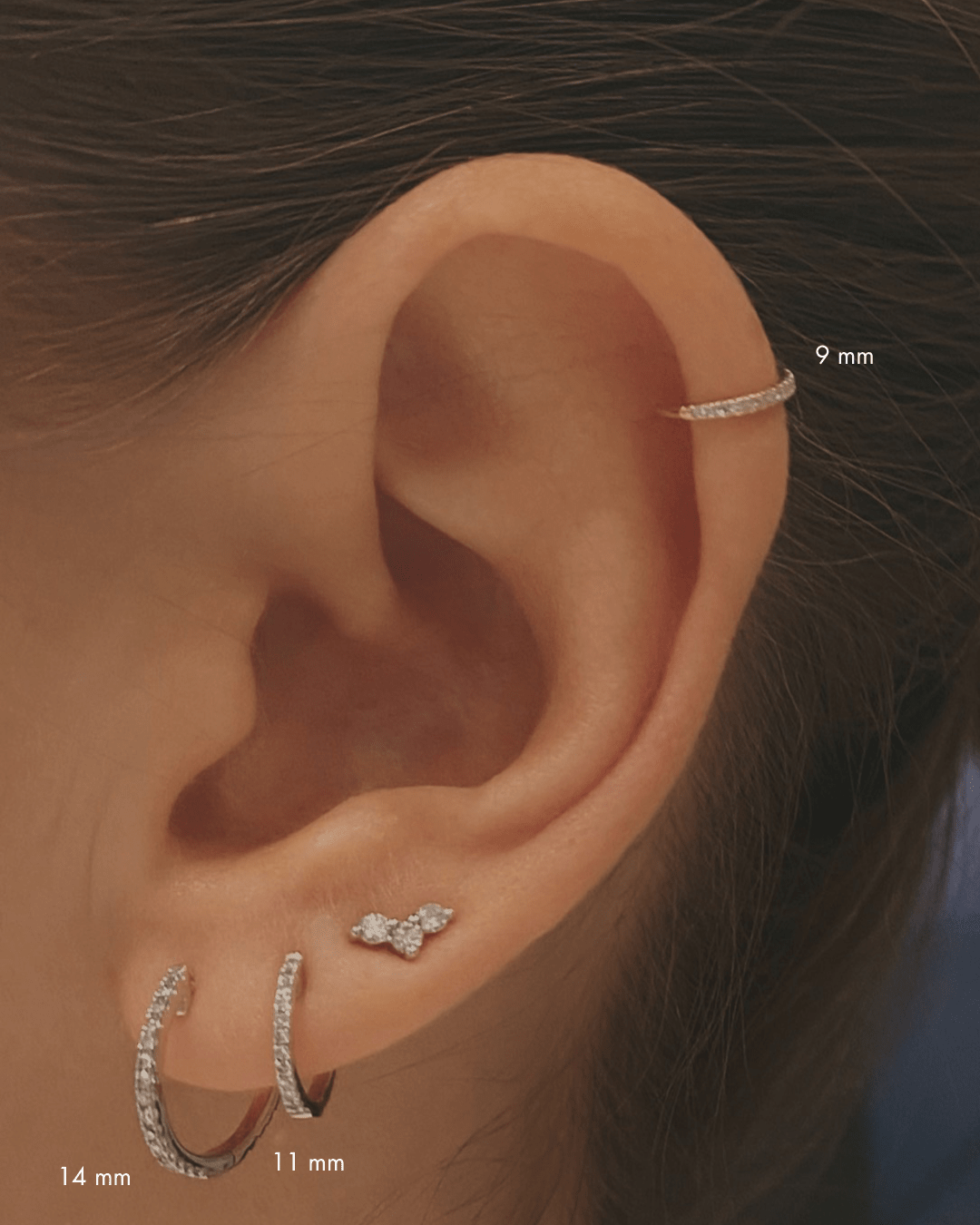 Honey I'm home labret in 14k yellow gold, set with natural diamonds, detail view.