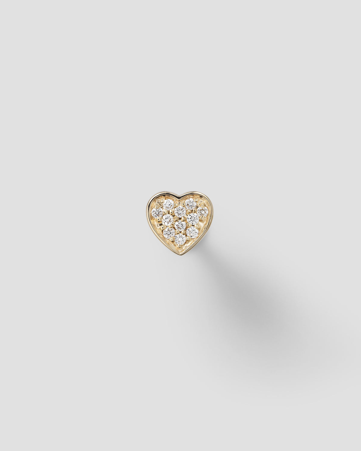 Ephyra pavé labret in 14k yellow gold, set with natural diamonds.