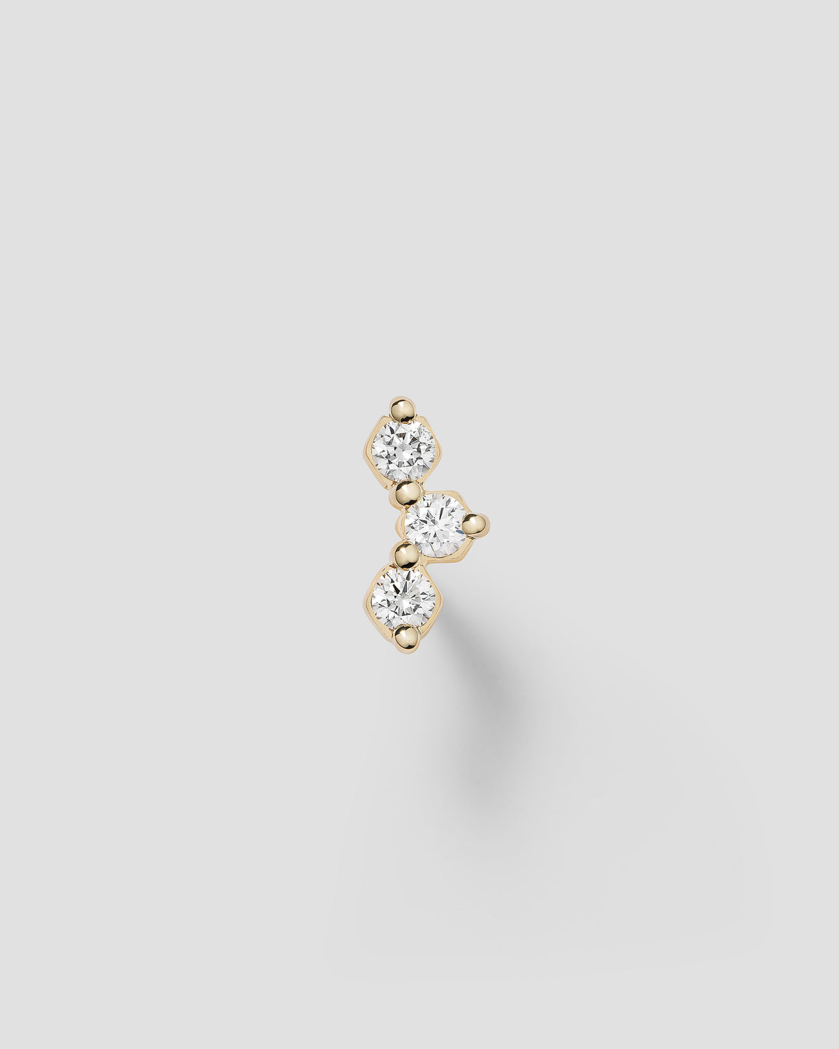 Honey I'm home labret in 14k yellow gold, set with natural diamonds.