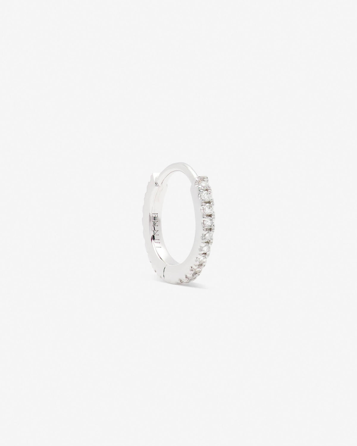 Repos huggie in 14k white gold.