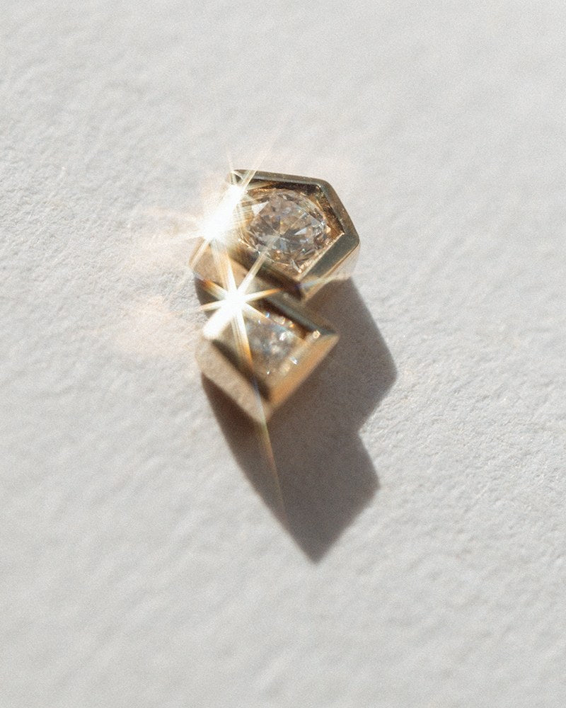 Diptych labret, shown worn.