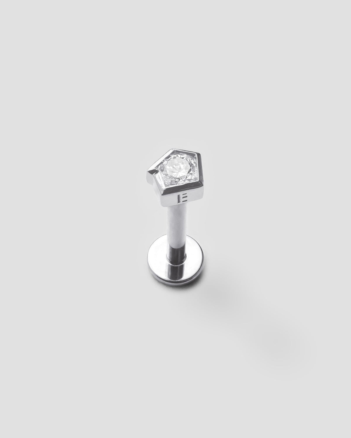 Echo labret in 14k white gold, set with a lab grown diamond, detail view.