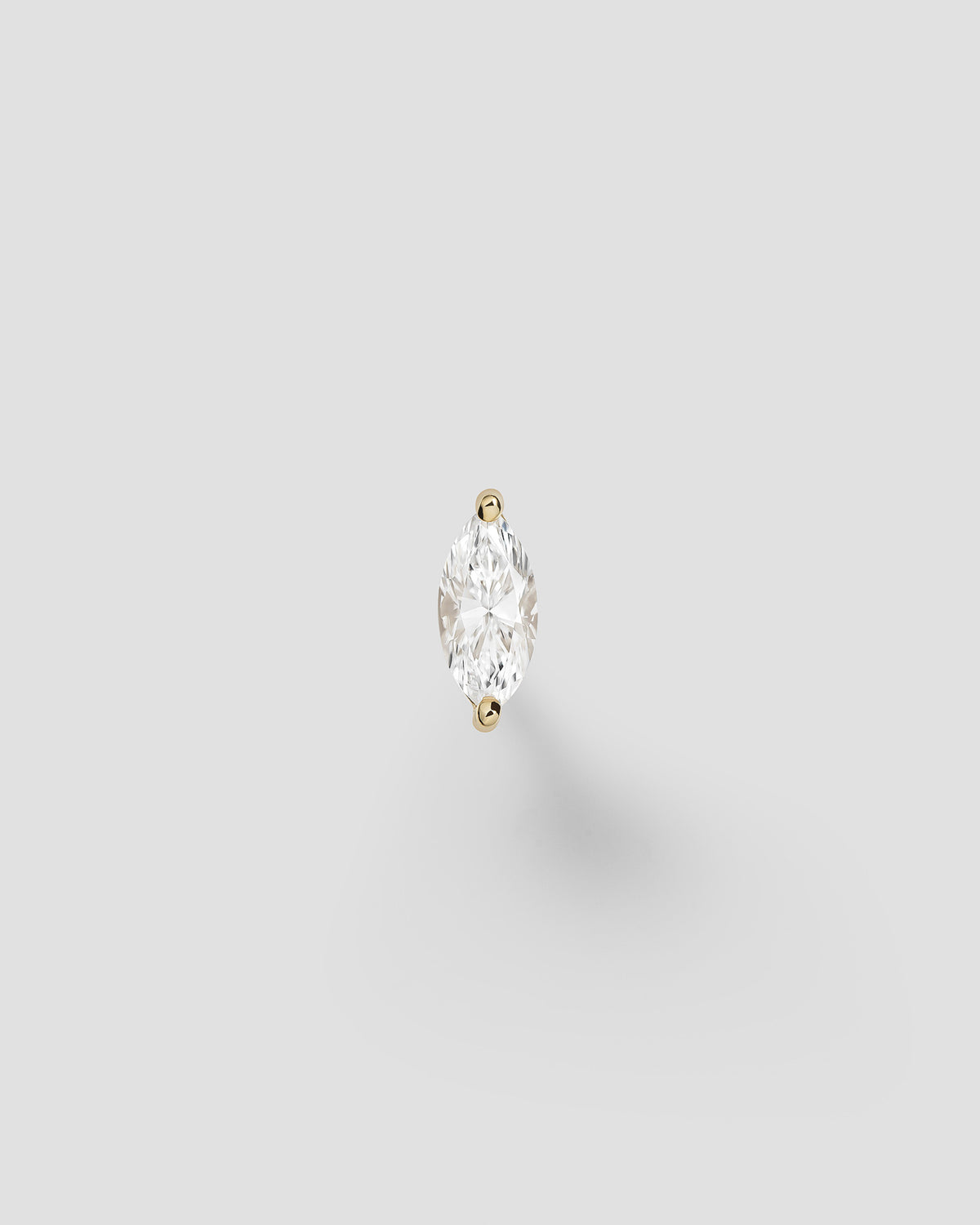 Inner strength labret in 14k yellow gold.