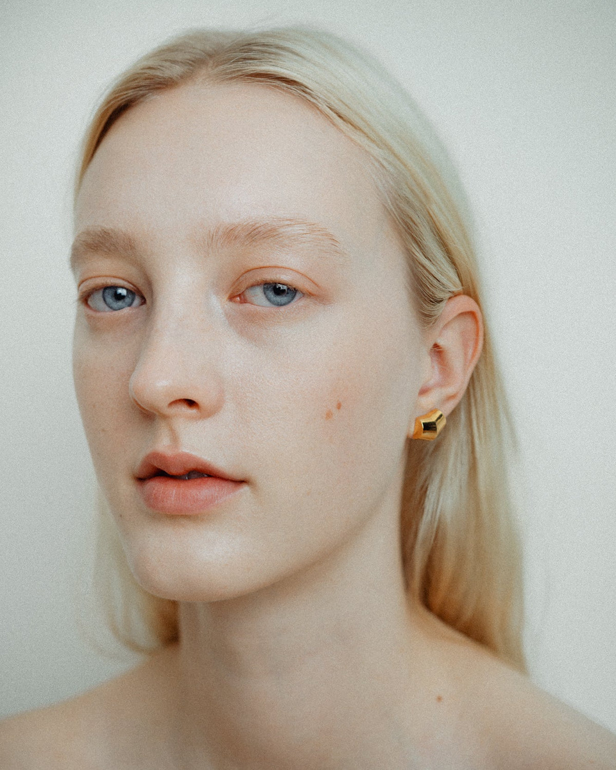Prism earrings, shown worn.
