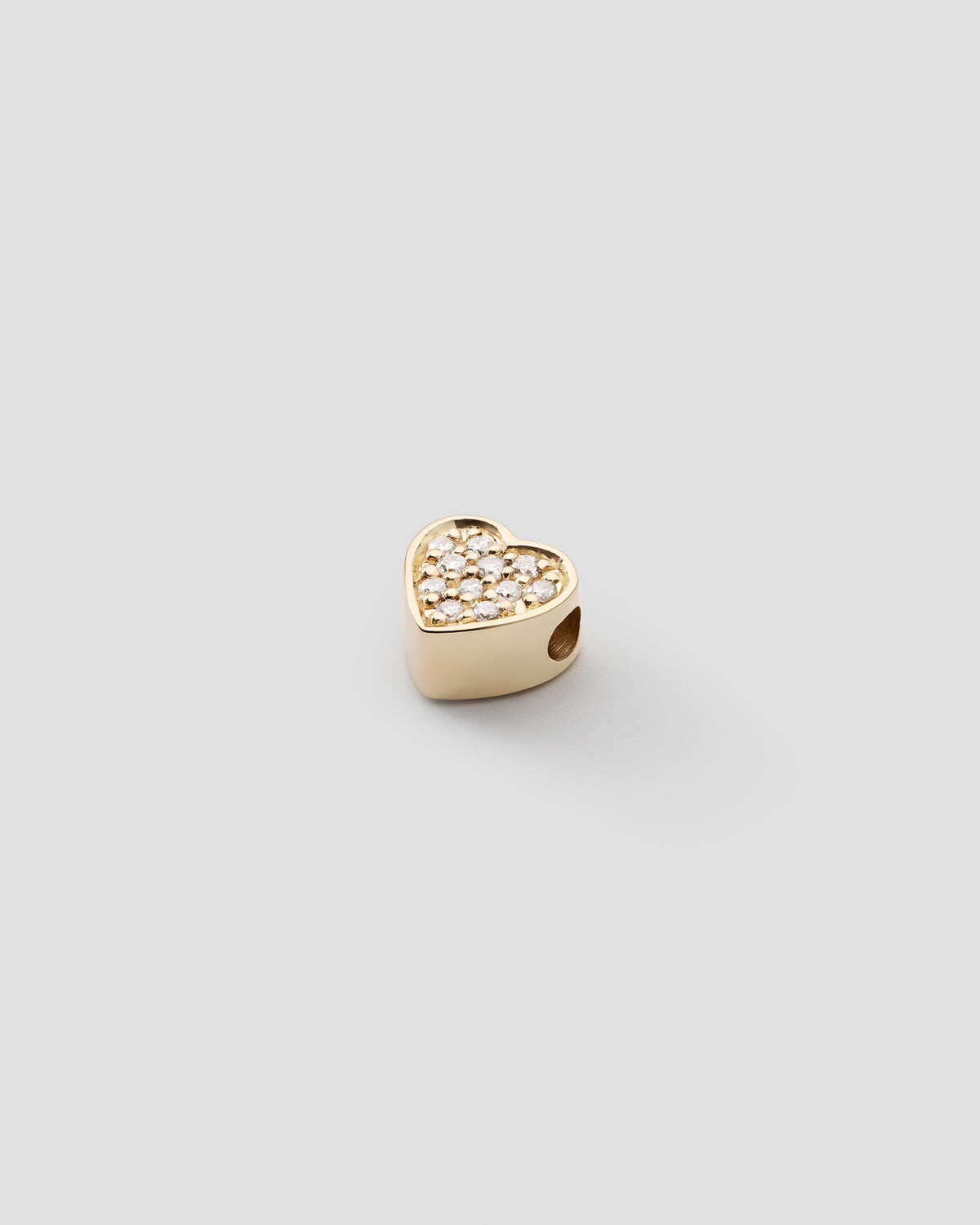 Ephyra pavé charm in 14k yellow gold, set with lab grown diamonds, detail view.
