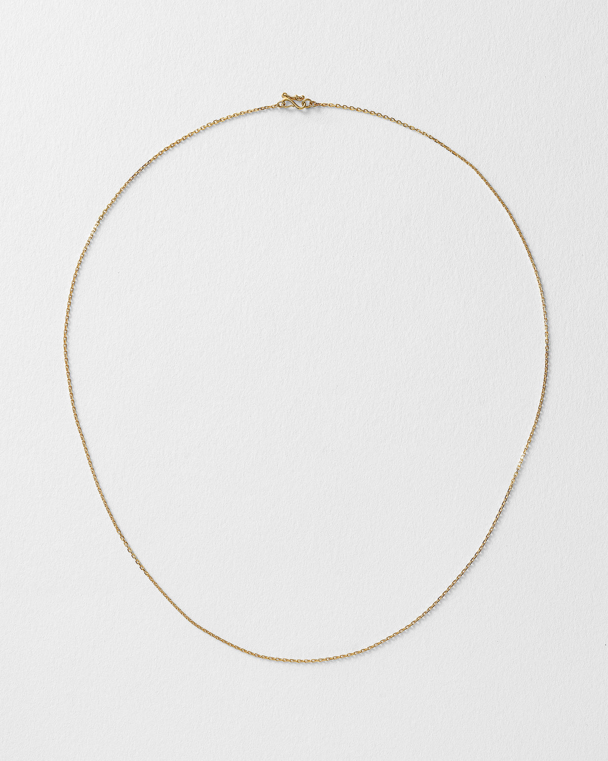 Diamond cut necklace in 18k yellow gold.