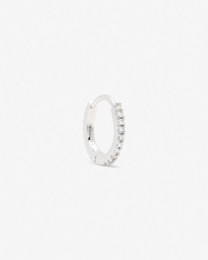 Repos huggie in 14k white gold.