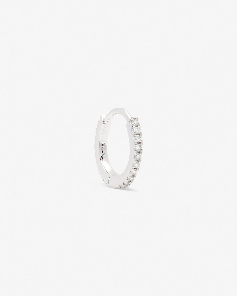 Repos huggie in 14k white gold.