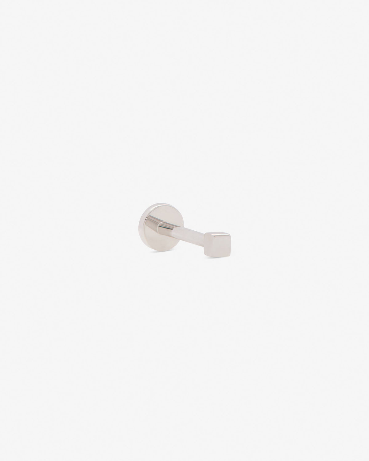 Hip to be square labret in 14k white gold, detail view.