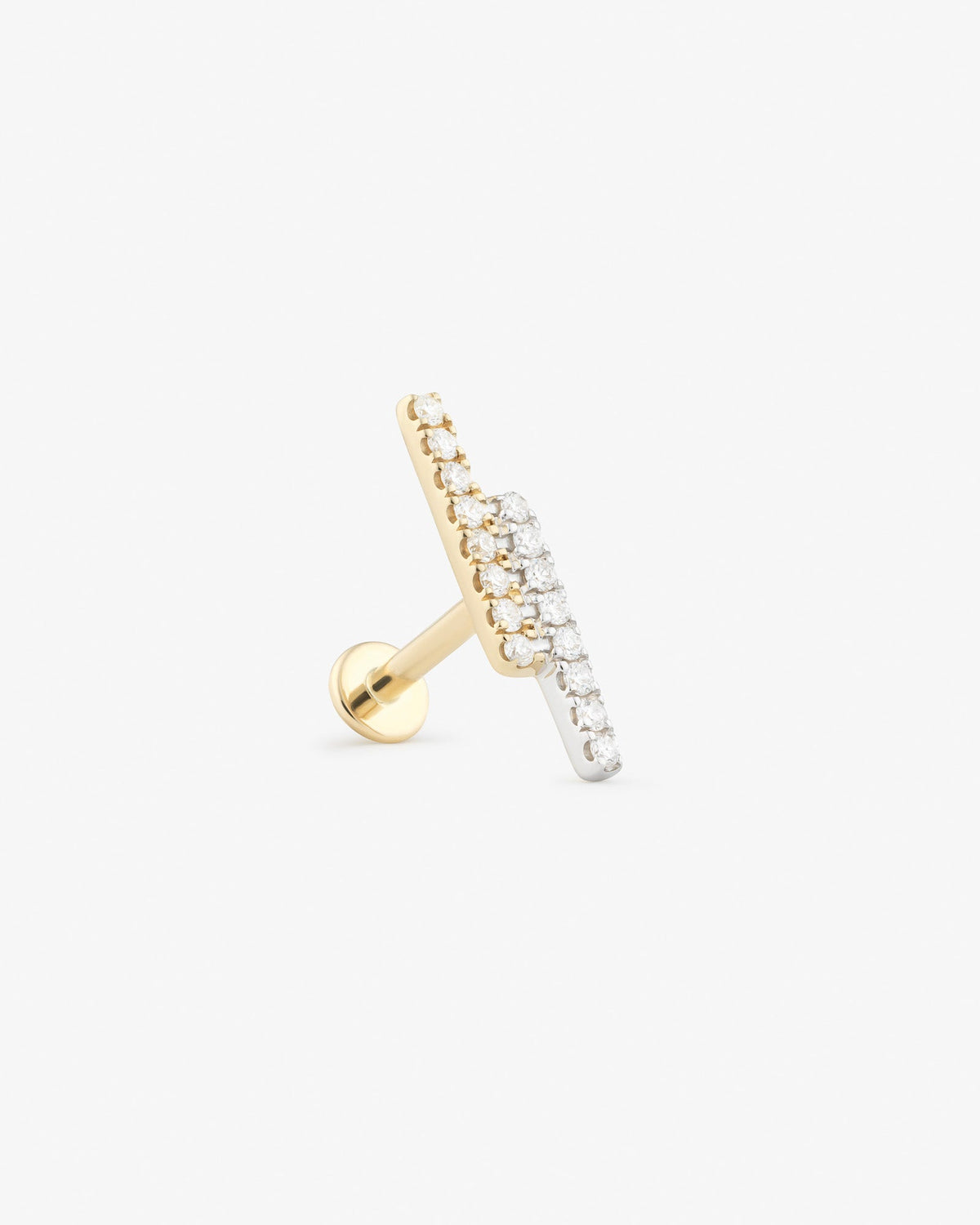 Eclair labret in 14k yellow gold, detail view.