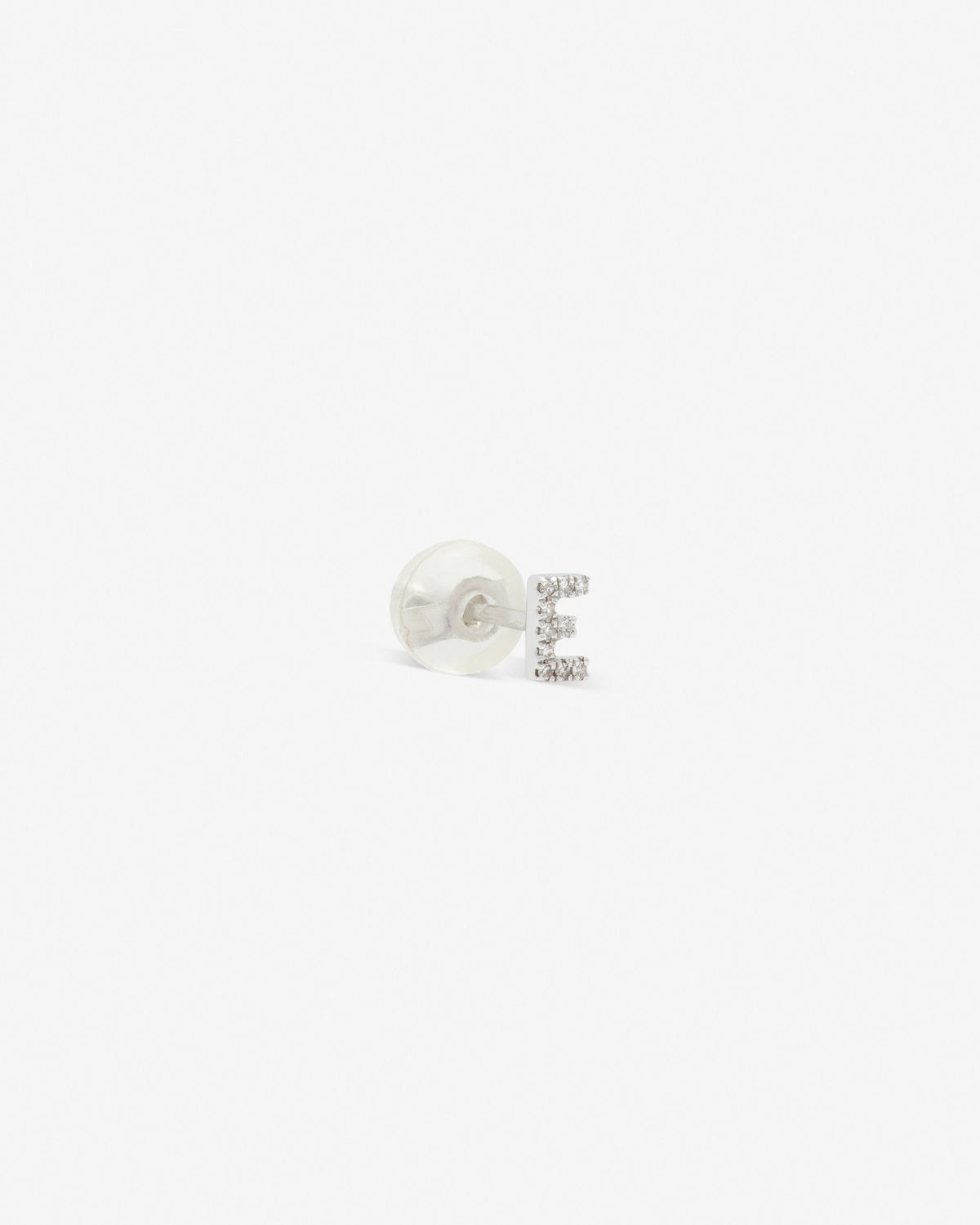 Letter stud in 14k white gold, detail view.