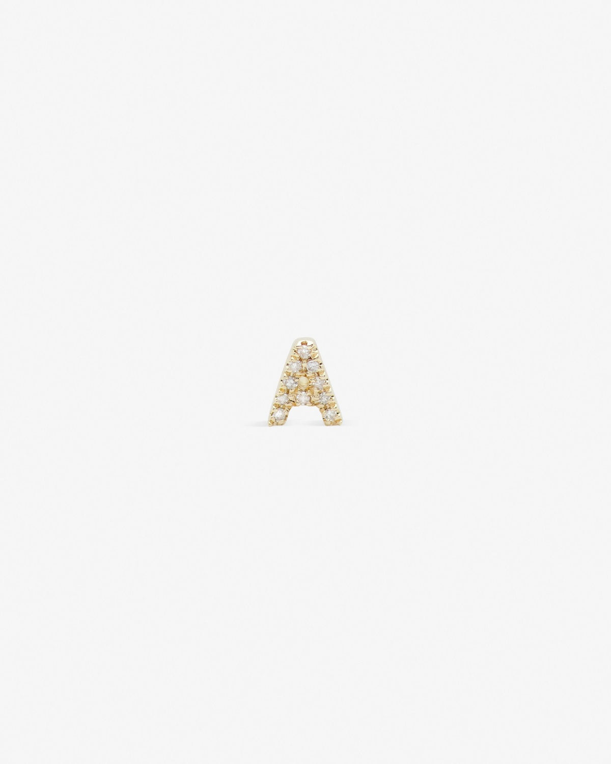 Letter stud in 14k yellow gold.